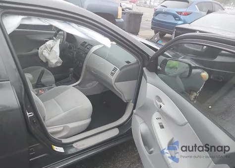 2009 Toyota Corolla Le from USA, damaged, VIN 1NXBU40E99Z092386